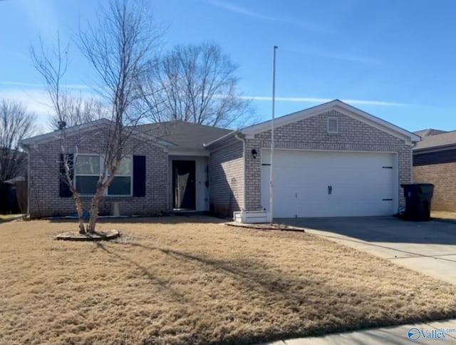 ranch-style house featuring a garage