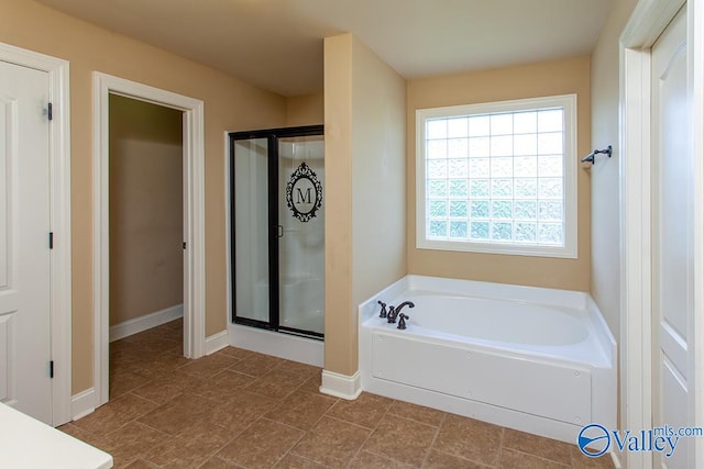 bathroom with independent shower and bath