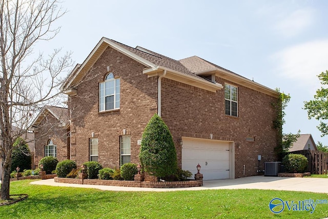 view of home's exterior featuring central AC unit, a lawn, and a garage