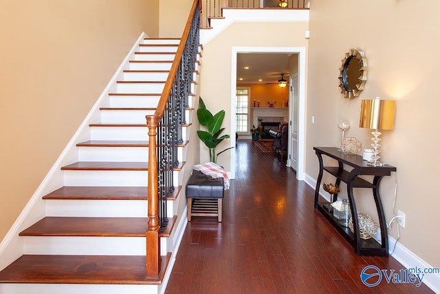 stairs with wood-type flooring