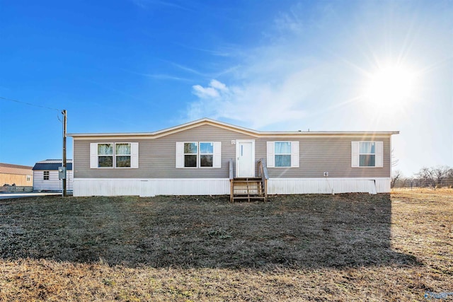 view of front of house featuring a front yard