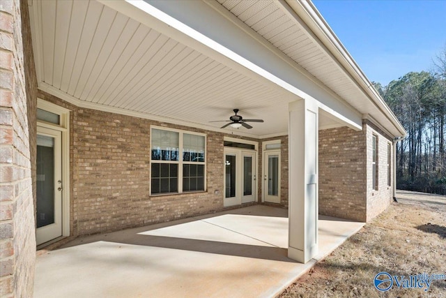 view of patio featuring ceiling fan