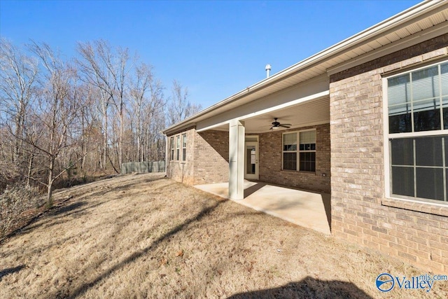 exterior space featuring a patio area and ceiling fan