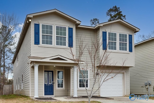 view of front of property featuring a garage