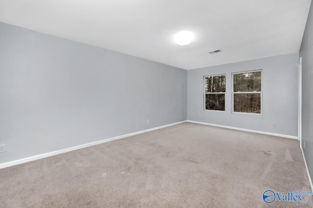 view of carpeted spare room