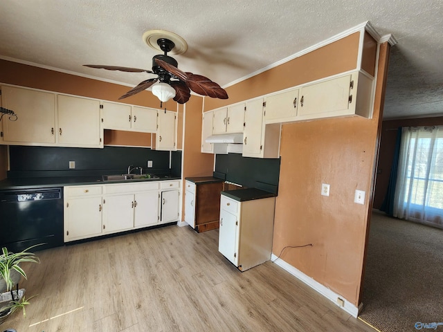 kitchen with light wood-style flooring, ornamental molding, a sink, dishwasher, and dark countertops