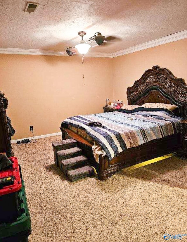 bedroom featuring carpet, visible vents, and ornamental molding