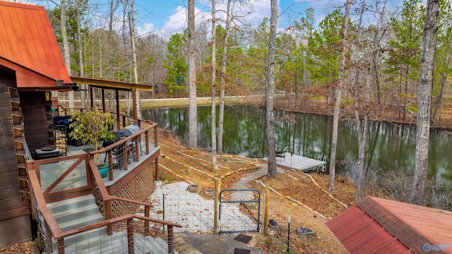 view of dock with a water view