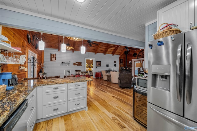 kitchen featuring wooden ceiling, light wood-style flooring, a peninsula, and stainless steel appliances