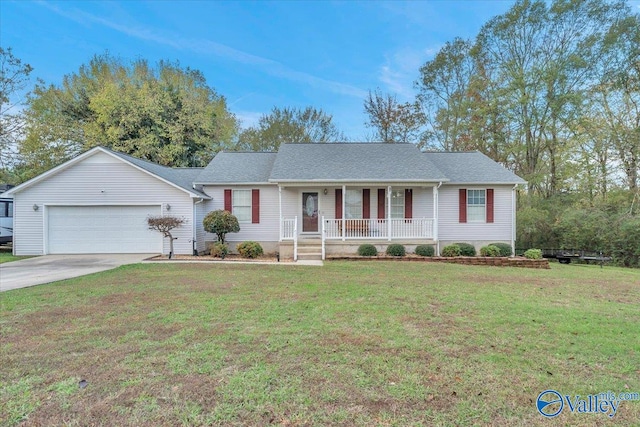 ranch-style home featuring a porch, a garage, and a front yard