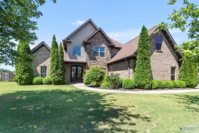 17259 Obsidian Cir, Athens, AL 35613 - craftsman house with french doors, a front lawn, and brick siding