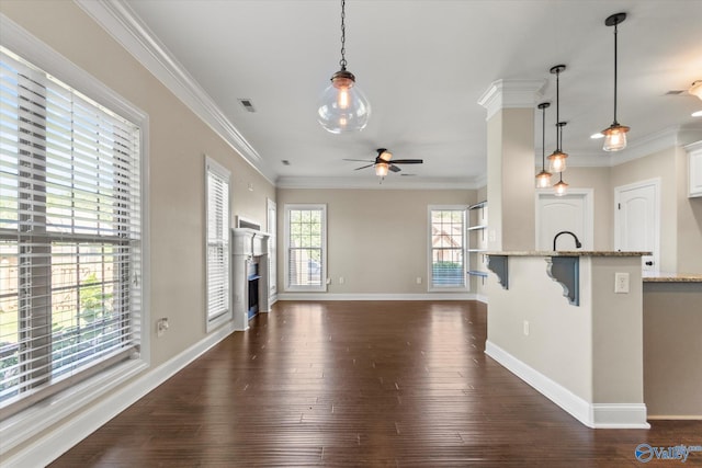 17259 Obsidian Cir, Athens, AL 35613 - unfurnished living room featuring ceiling fan, a fireplace, baseboards, dark wood-style flooring, and ornamental molding