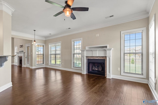 17259 Obsidian Cir, Athens, AL 35613 - unfurnished living room with a fireplace, dark wood finished floors, a ceiling fan, healthy amount of natural light, and crown molding