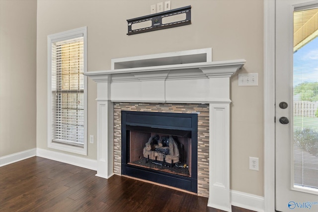 17259 Obsidian Cir, Athens, AL 35613 - detailed view of wood finished floors, a fireplace, and baseboards