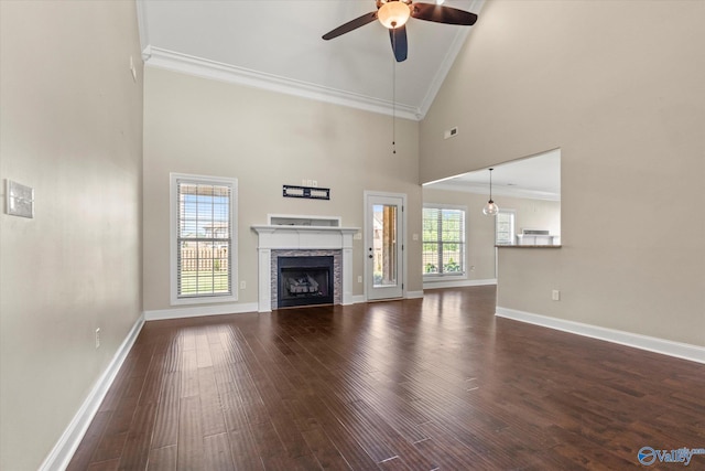 17259 Obsidian Cir, Athens, AL 35613 - unfurnished living room featuring high vaulted ceiling, ceiling fan, ornamental molding, baseboards, and dark wood finished floors