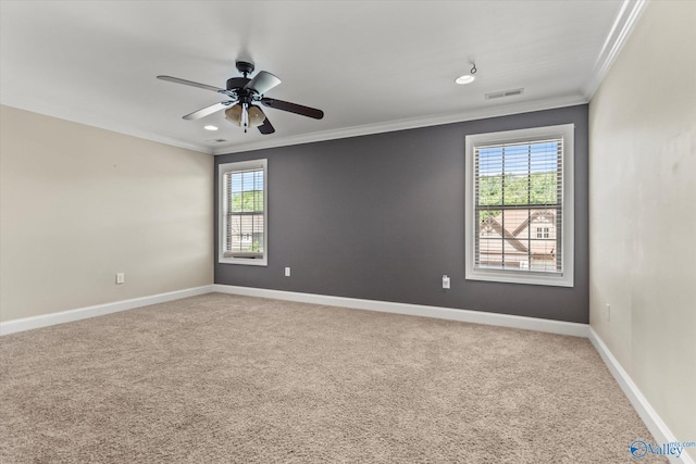 17259 Obsidian Cir, Athens, AL 35613 - empty room featuring crown molding, plenty of natural light, light colored carpet, ceiling fan, and baseboards