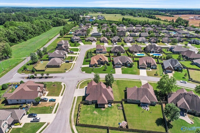 17259 Obsidian Cir, Athens, AL 35613 - aerial view of property and surrounding area with nearby suburban area and a forest