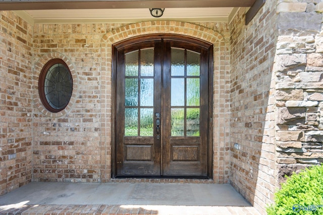 17259 Obsidian Cir, Athens, AL 35613 - view of exterior entry with french doors and brick siding