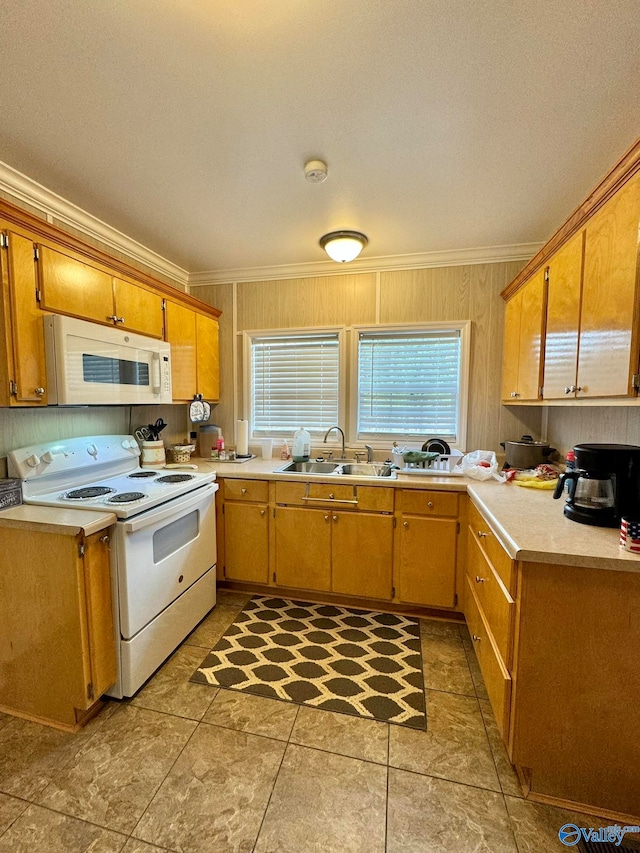 kitchen featuring crown molding, white appliances, sink, and a textured ceiling