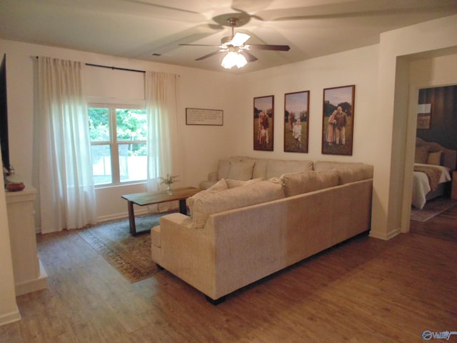 110 Oak Path Ln, Harvest, AL 35749 - living room with wood finished floors, ceiling fan, and baseboards