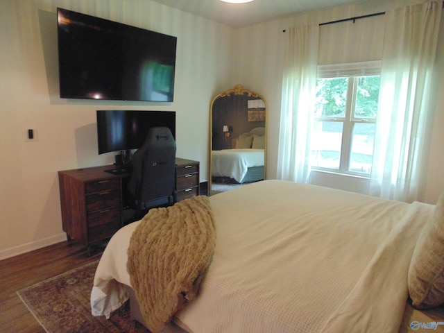 110 Oak Path Ln, Harvest, AL 35749 - bedroom with baseboards and wood finished floors