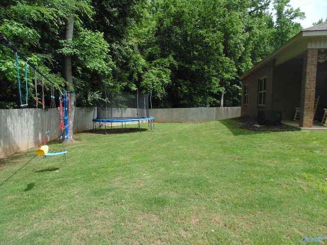 110 Oak Path Ln, Harvest, AL 35749 - view of yard with a trampoline