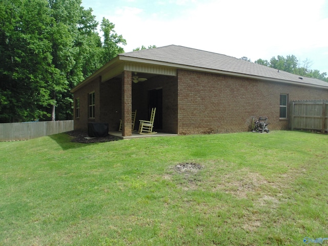 110 Oak Path Ln, Harvest, AL 35749 - rear view of house featuring brick siding and a patio