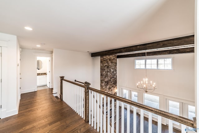 corridor with baseboards, wood finished floors, an inviting chandelier, an upstairs landing, and recessed lighting