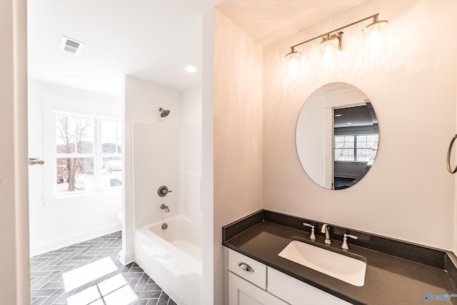 bathroom featuring shower / bathtub combination, visible vents, toilet, vanity, and baseboards