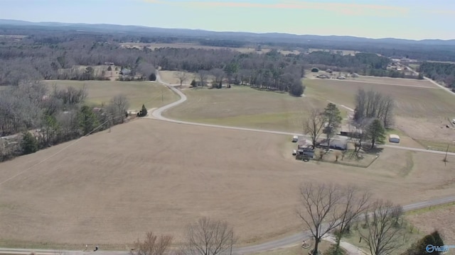 birds eye view of property with a mountain view and a rural view