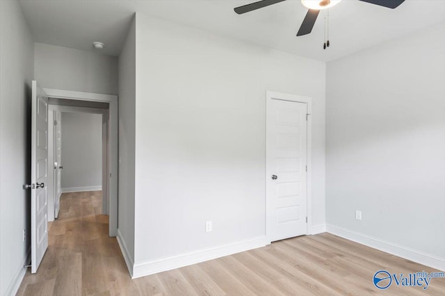 unfurnished bedroom with light wood-type flooring, a closet, and ceiling fan