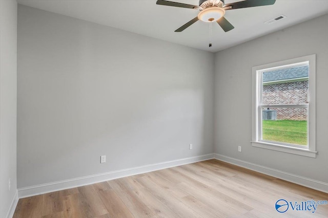 spare room featuring ceiling fan and light hardwood / wood-style floors