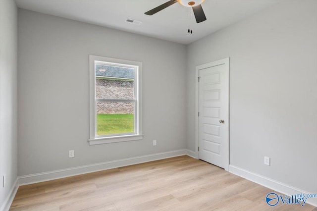 spare room with ceiling fan and light hardwood / wood-style floors