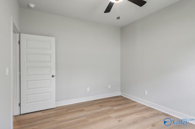 unfurnished room featuring ceiling fan and light hardwood / wood-style flooring