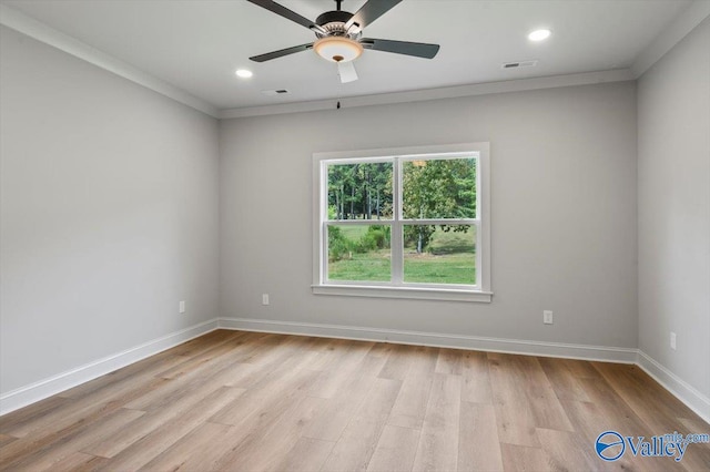 unfurnished room with ceiling fan, ornamental molding, and light hardwood / wood-style flooring