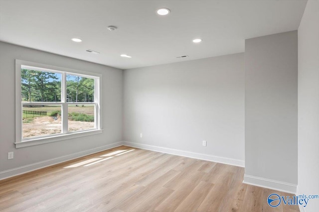 empty room with light wood-type flooring