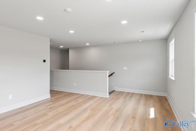 unfurnished room featuring light wood-type flooring