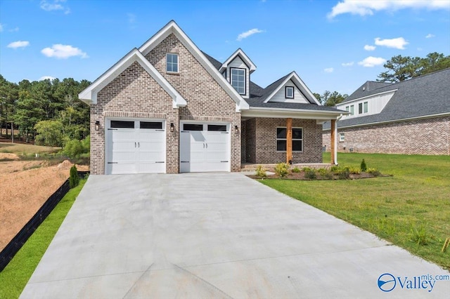 craftsman-style home featuring a front lawn and a garage