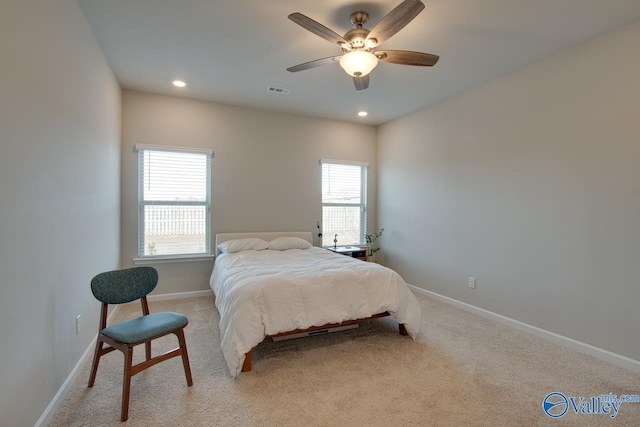 bedroom with visible vents, baseboards, a ceiling fan, light colored carpet, and recessed lighting