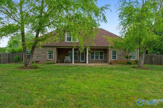 back of property featuring a patio