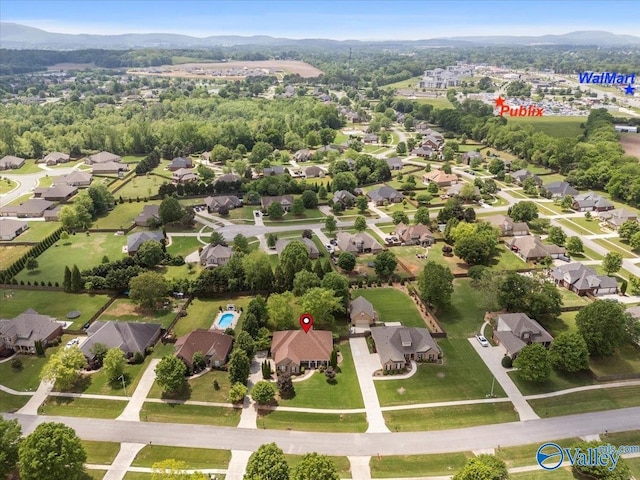 aerial view of residential area with a mountainous background