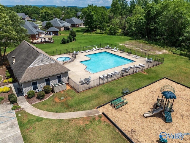 community pool featuring a patio area