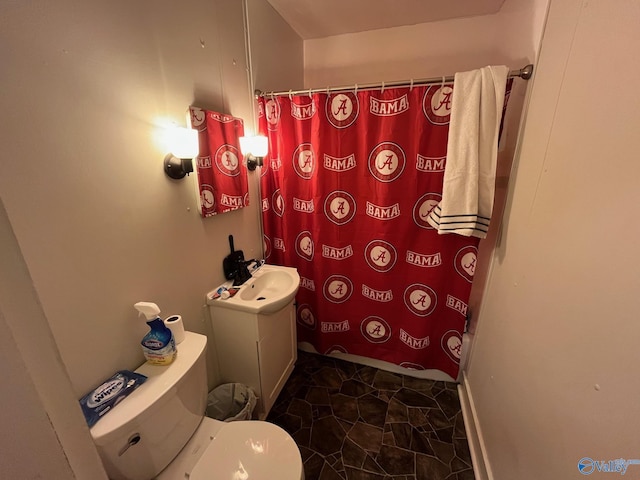 bathroom with tile patterned flooring, vanity, toilet, and a shower with shower curtain