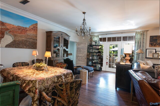 kitchen featuring blue cabinets, hardwood / wood-style floors, backsplash, and black gas range oven