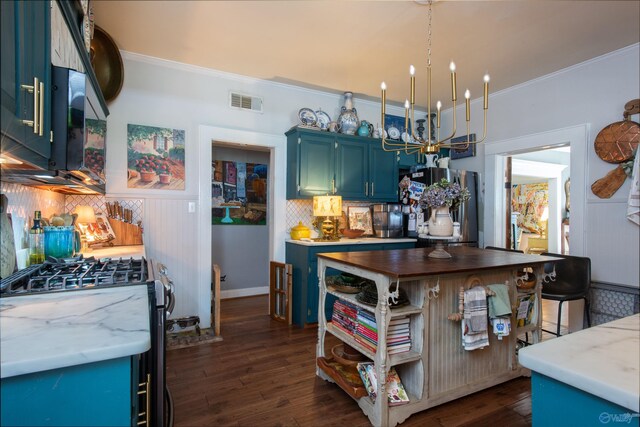 kitchen with sink and blue cabinetry