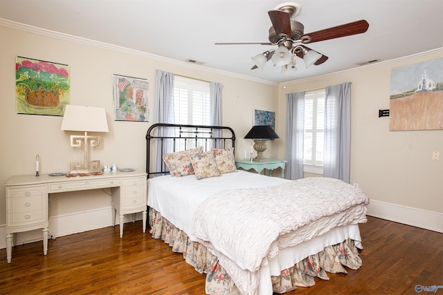 bedroom with multiple windows, ornamental molding, dark wood-type flooring, and visible vents