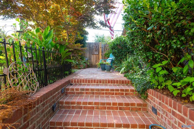 rear view of house with an outdoor hangout area and a patio area