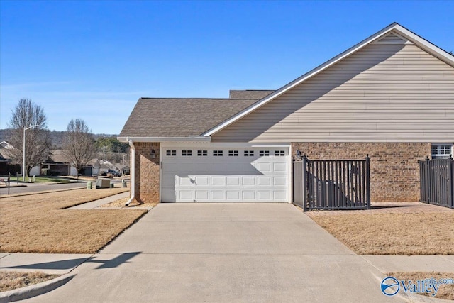 view of side of property with a garage