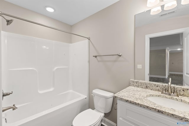 full bathroom featuring shower / bathing tub combination, vanity, and toilet