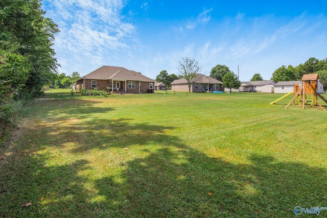 view of yard with a playground